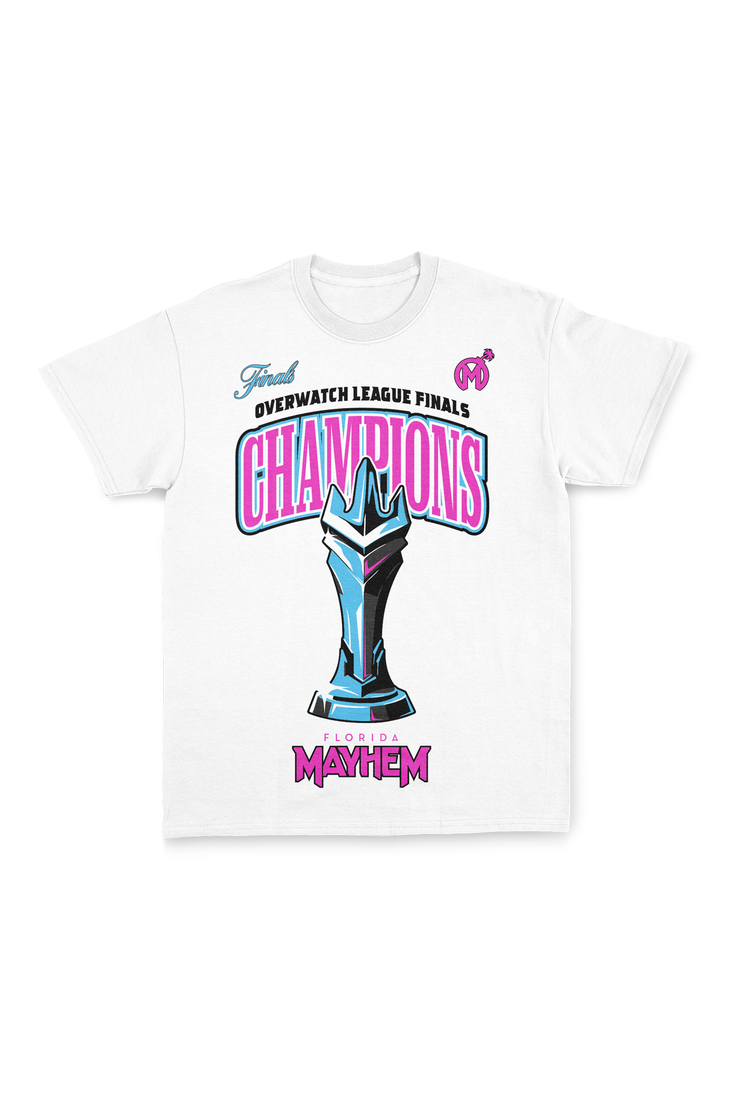 A white short-sleeved t-shirt featuring vibrant graphics. At the top, the word "Finals" in cyan is paired with "Overwatch League Finals" in pink. Below, the word "CHAMPIONS" is boldly displayed in pink, with a detailed blue and cyan trophy design beneath. The year 2023 flank the trophy, emphasizing the championship year. The phrase "Florida Mayhem" is written in bright pink at the bottom, with the team&